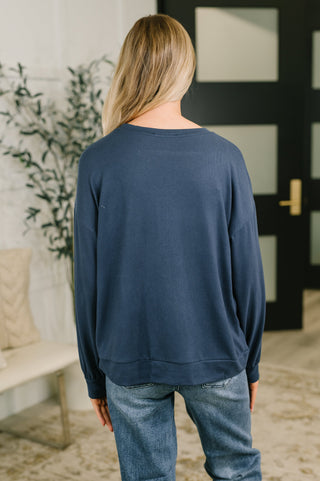 Genuine Interest Long Sleeve Top