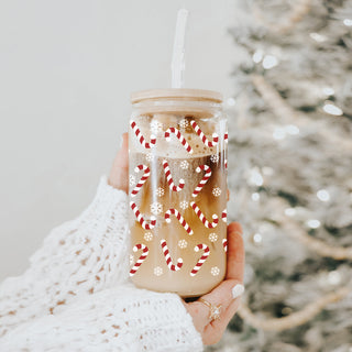Christmas coffee tumbler – 17oz glass cup with candy cane and snowflake design
Holiday coffee mug – glass tumbler with bamboo lid and reusable straw