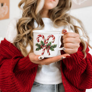 Candy cane design mug for holiday coffee bar
Candy cane mug for Christmas kitchen decor
Candy cane mug for seasonal home decor
Festive ceramic mug with holiday candy cane illustration
Candy cane Christmas mug for peppermint mocha
Holiday mug for Christmas morning coffee
Candy cane mug for winter coffee lovers
Christmas mug with festive red and green design
Candy cane mug with holly leaf design
Ceramic holiday mug with candy cane pattern
Christmas mug with holiday greenery and candy canes