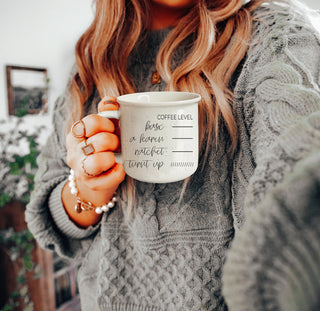 Double sided ceramic mug with caffeine level indicator