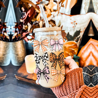 Aesthetic bow pattern glass tumbler with bamboo lid
Pink and orange fall coquette drinking glass
Cottagecore bow mason jar style tumbler