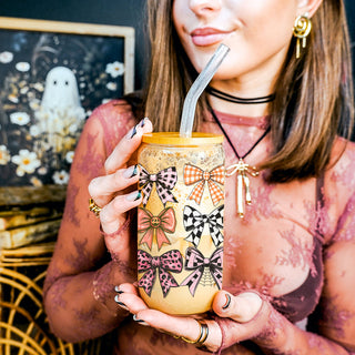 Romantic fall glass tumbler with bows
Aesthetic autumn mason jar with bamboo top
Coquette style drinking glass with patterns