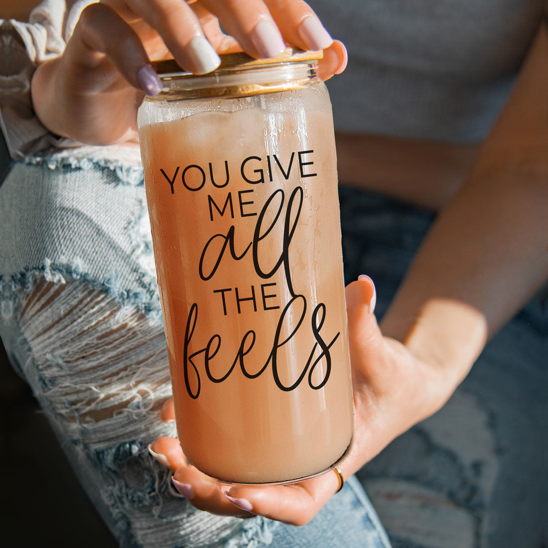 "You Give Me All the Feels" glass cup with bamboo lid and straw, 20oz.
20oz glass cup with bamboo lid and glass straw, featuring "You Give Me All the Feels" saying.
Perfect 20oz glass cup with bamboo lid and straw, "You Give Me All the Feels" design.