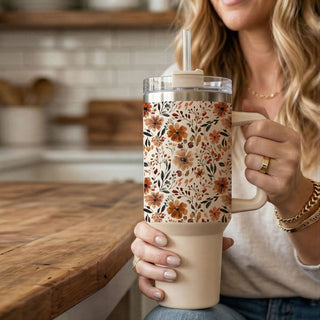 pumpkin spice floral cup aesthetic
neutral flower tumbler for moms
cute floral stanley dupe tumbler
cozy season flower tumbler
fall meadow floral cup
autumn floral water bottle aesthetic
cream floral tumbler with handle
cute floral cup for pumpkin patch
fall cottage aesthetic tumbler
neutral floral gift for coffee lovers