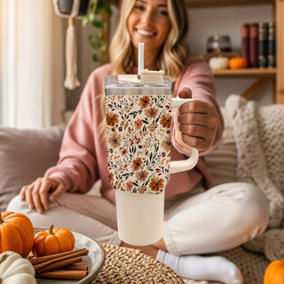 cute floral fall accessory
neutral botanical hydration cup
pumpkin spice flower tumbler aesthetic
fall floral coffee station cup
earthy autumn floral tumbler
cozy floral gift for moms
neutral cream floral tumbler
cute flower pattern coffee tumbler