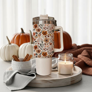 cute thanksgiving floral tumbler
stylish autumn floral drinkware
warm cozy flower tumbler
fall market aesthetic tumbler
neutral floral cup with straw lid
cute floral tumbler for office desk
autumn leaves and flowers aesthetic cup
cozy coffee bar floral tumbler
minimalist fall floral tumbler