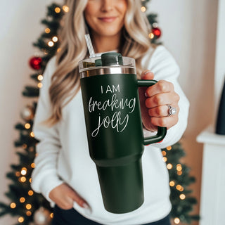 Funny Christmas gifts for coffee lovers
Christmas water bottles that fit into car
Two tumblers red and green with 'I AM freaking jolly' text on a white surface.
Alternative to Yeti Christmas tumbler - I am freaking jolly 40oz red green
Christmas 40 oz cups