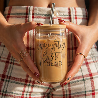 Funny 17oz Christmas glass tumbler featuring “Naughty List Legend.” Includes bamboo-style lid and metal straw. Perfect for iced coffee, cold brew, holiday drinks, Secret Santa gifts, stocking stuffers, and Christmas gifts for her.