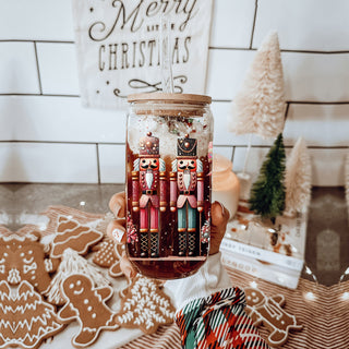 Boho Nutcracker Christmas glass cup – festive drinkware with pinks, teals, and gold
Christmas coffee tumbler – Nutcracker soldiers and boho floral design with glitter