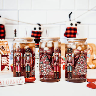 Christmas morning coffee cup – glass tumbler with boho floral Nutcracker and tree
Holiday sparkle drinkware – Nutcracker soldiers and Christmas tree with glitter accents