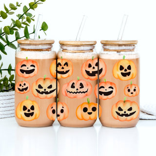 Glass Halloween cup with bamboo lid
Reusable pumpkin face drink tumbler for fall beverages