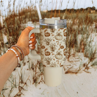autumn harvest travel tumbler
cozy neutral pumpkin cup
pumpkin patch coffee tumbler
stylish fall pumpkin tumbler
neutral cozy season drinkware
pumpkin inspired travel cup
cute oversized autumn tumbler
fall themed coffee tumbler
pumpkin spice season cup aesthetic
