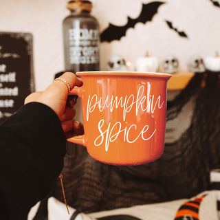 halloween and fall style drinkware for seasonal sippers
autumn girls night in scene with snacks and coffee mug
fall themed gift bundle with mug and treats