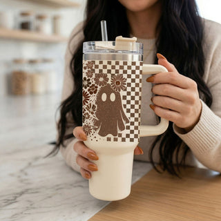Floral checkered tumbler with spooky fall theme

Boho fall 40oz tumbler with ghost and skull print

Large retro tumbler with autumn checkered design

Halloween coffee tumbler with ghost and floral pattern

Stylish fall tumbler with vintage spooky aesthetic