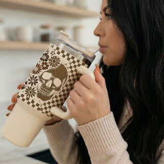 Retro fall checkered 40oz tumbler with ghost design

Spooky floral 40oz tumbler with skull and checker pattern

Vintage autumn tumbler with ghost and floral graphic

Brown checkered 40oz tumbler with fall ghost print

Halloween-inspired 40oz tumbler with skull and florals