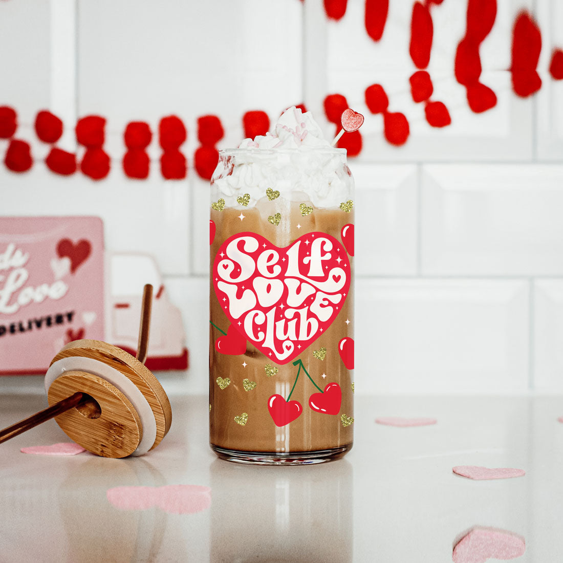 Women empowerment Valentine’s Day gifts featuring 20oz glass cups with Self Love Club and cherry graphics.
20oz glass cups with bamboo lid and glass straw, perfect for single women’s Valentine’s gifts and self love.