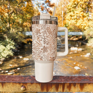 thanksgiving aesthetic tumbler
cute cream colored tumbler
fall morning coffee cup
stylish tumbler for autumn season
pumpkin spice drinkware aesthetic
neutral aesthetic handled cup
cute gift for pumpkin spice lover
autumn leaves cup with straw