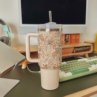 pumpkin spice tumbler with handle
fall leaves drinkware aesthetic
cute coffee tumbler neutral tones
autumn coffee aesthetic tumbler
beige cozy season cup
cute neutral iced coffee tumbler
fall inspired drinkware for women