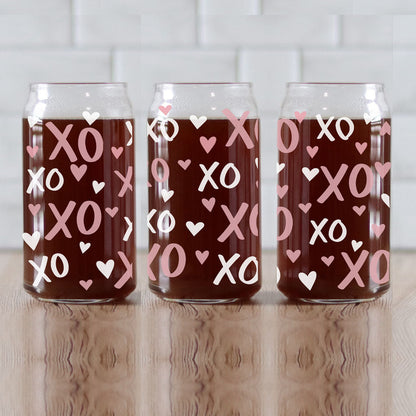 Pink XO’s and hearts 20oz glass cups with bamboo lid and glass straw, perfect for Galentine’s or Valentine’s gifts.
Playful 20oz glass cups with bamboo lid and glass straw featuring pink XO’s and hearts for a fun and cute gift.